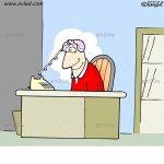 Man at a desk with a phone on his head